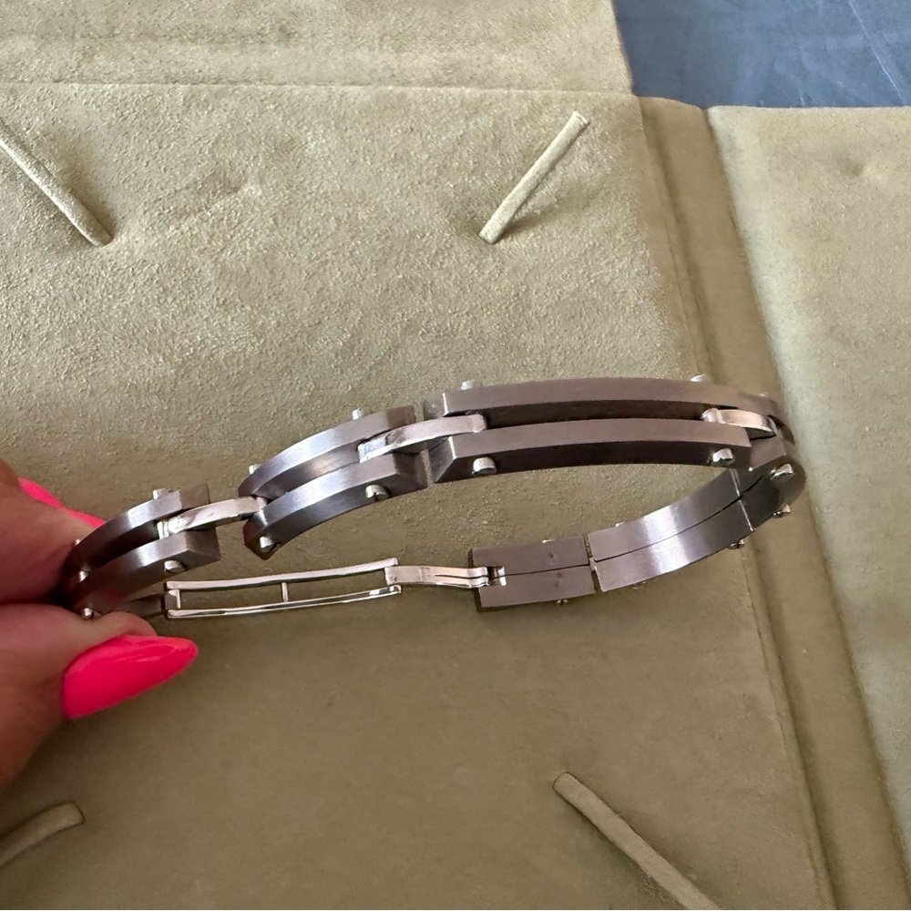 Titanium and Gray Metal Bracelet